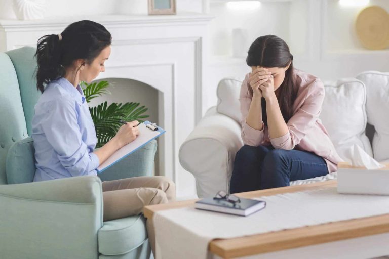 desperate-lady-crying-at-therapist-session-sharing-YCS5H5Y-scaled.jpg